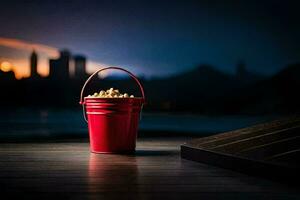 un Cubeta de palomitas de maiz en un mesa en frente de un ciudad horizonte. generado por ai foto