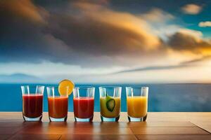 five glasses of juice on a table with a sunset in the background. AI-Generated photo