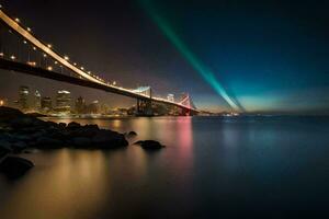 el dorado portón puente a noche con un arco iris ligero. generado por ai foto
