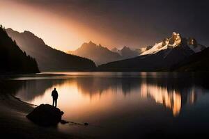 un persona en pie en un rock en frente de un lago a puesta de sol. generado por ai foto