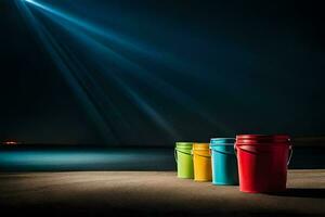 three colorful buckets on the beach at night. AI-Generated photo