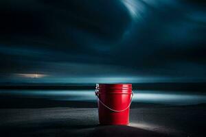 a red bucket sits on the beach at night. AI-Generated photo