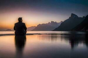 a man sitting on the edge of a lake at sunset. AI-Generated photo