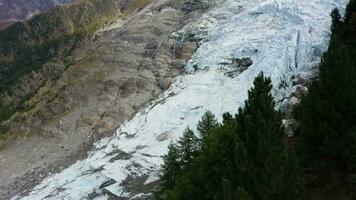 Bossons Glacier in French Alps. Aerial View. France. Drone Flies Forward. Introduction Reveal Shot. Establishing Shot video