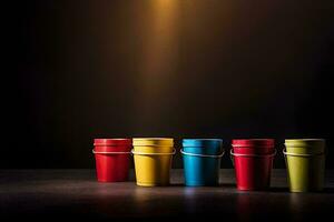 five colorful buckets on a dark table. AI-Generated photo