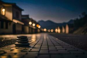 a stone path in the middle of a town at night. AI-Generated photo