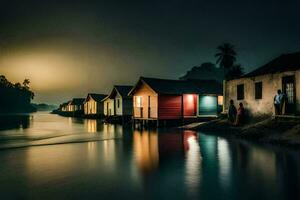 un fila de casas en el apuntalar de un río a noche. generado por ai foto