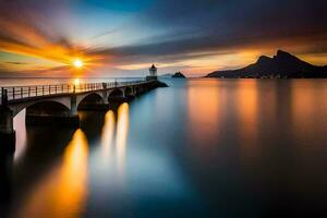 un largo exposición fotografía de un puente y faro a puesta de sol. generado por ai foto