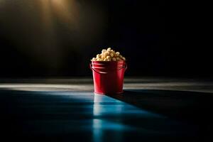 a red bucket filled with popcorn on a dark floor. AI-Generated photo