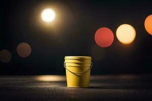 a yellow bucket sitting on the street at night. AI-Generated photo
