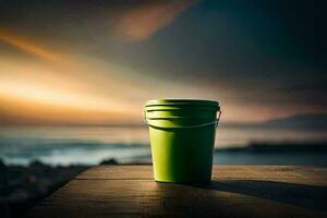 a green bucket sitting on a wooden table in front of the ocean. AI-Generated photo