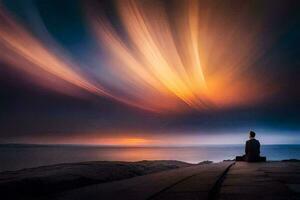 a man sitting on the edge of a cliff looking at the sky. AI-Generated photo