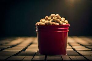 a red bucket filled with peanuts on a wooden table. AI-Generated photo