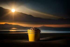 a bucket of sand on the beach at sunset. AI-Generated photo