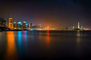 el ciudad luces son reflejado en el agua a noche. generado por ai foto