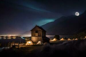 un cabina en el montañas con un lleno Luna y luces. generado por ai foto