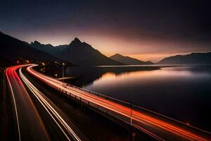 a long exposure photograph of a road and water at sunset. AI-Generated photo