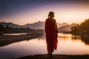 a woman in a red robe stands by the water at sunset. AI-Generated photo