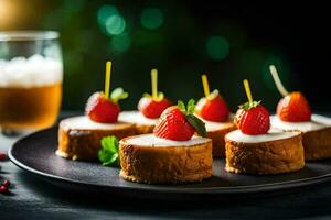 small cakes with strawberries on top and a glass of beer. AI-Generated photo