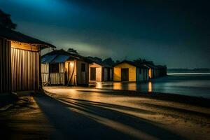 un fila de de madera chozas en el playa a noche. generado por ai foto