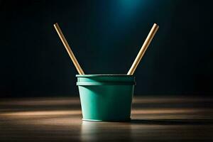 a green bucket with two wooden sticks in it. AI-Generated photo
