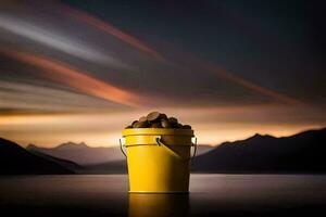 a yellow bucket filled with rocks sitting on a table. AI-Generated photo