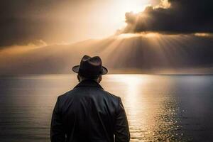 a man in a hat and coat looking out over the ocean. AI-Generated photo