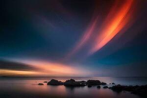 a long exposure photograph of a colorful sky and ocean. AI-Generated photo