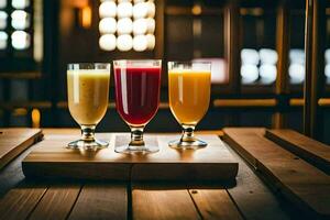 three glasses of juice on a wooden table. AI-Generated photo