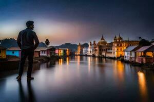 a man stands on the edge of a river in front of colorful buildings. AI-Generated photo