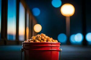 a bucket filled with nuts sitting on a street. AI-Generated photo