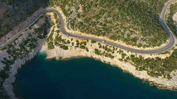Car on Road along Coastline. Aerial Vertical Top-Down View. Turkey. Drone Flies Sideways video