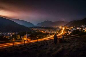 a night shot of a valley and mountains at night. AI-Generated photo