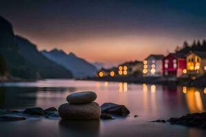 rocas en el agua a oscuridad con casas en el antecedentes. generado por ai foto