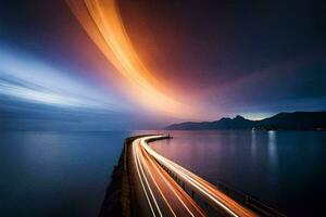 a long exposure photograph of a car driving on a road over the ocean. AI-Generated photo