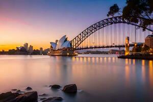 the sydney opera house and bridge at sunset. AI-Generated photo