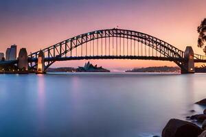 the sydney harbour bridge at sunset. AI-Generated photo