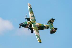 Polish Air Force PZL M28 Bryza transport plane flying. Aviation and military aircraft. photo