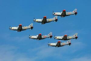 Polish Air Force PZL-130 Orlik trainer plane flying. Aviation and military aircraft. photo