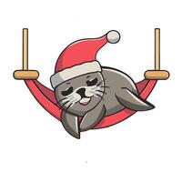 adorable seal in a santa hat sleeping on a hammock photo