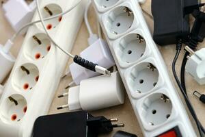 Many electrical plugs network congestion. The concept of electrical dependence photo