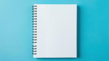 Mockup. A clean open notebook with blank sheets on a clean blue background. Top view. Flat lay. With copy space. Template for design. Spiral organizer. AI generated photo