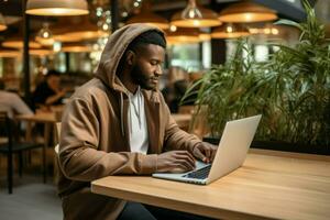 Side view African American people wear hood use laptop on table in coffee cafe. Generative AI photo