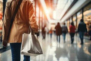 Blurred background of a modern shopping mall with some shoppers. Generative AI photo