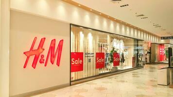 Front view of HM store in AEON Shopping Mall at South Jakarta photo