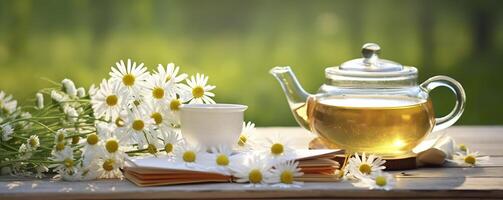 Chamomile flowers, books, a glass teapot, and a cup of herbal tea on a table closeup. Generative AI photo