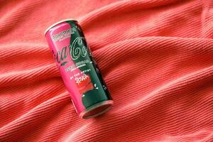 KYIV, UKRAINE - JULY 7, 2023 Coca-Cola zero sugar can with Rosalia design limited edition on red background photo