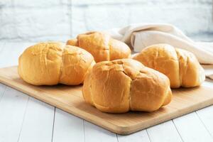 Fresh wheat bread rolls. Rolls for a hot dog or hamburger. White background copy space. photo