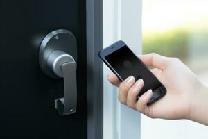 A close-up of a hand holding a key fob or smartphone to unlock a smart door lock. Generative Ai photo