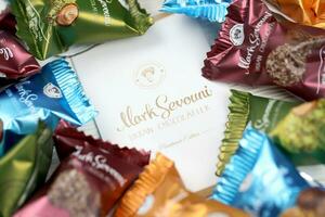 KHARKOV, UKRAINE - FEBRUARY 14, 2021 Mark Sevouni urban chocolatier handmade edition round candies. Mark Sevouni is a chocolate manufacturer from YCC based in Yerevan, Armenia photo